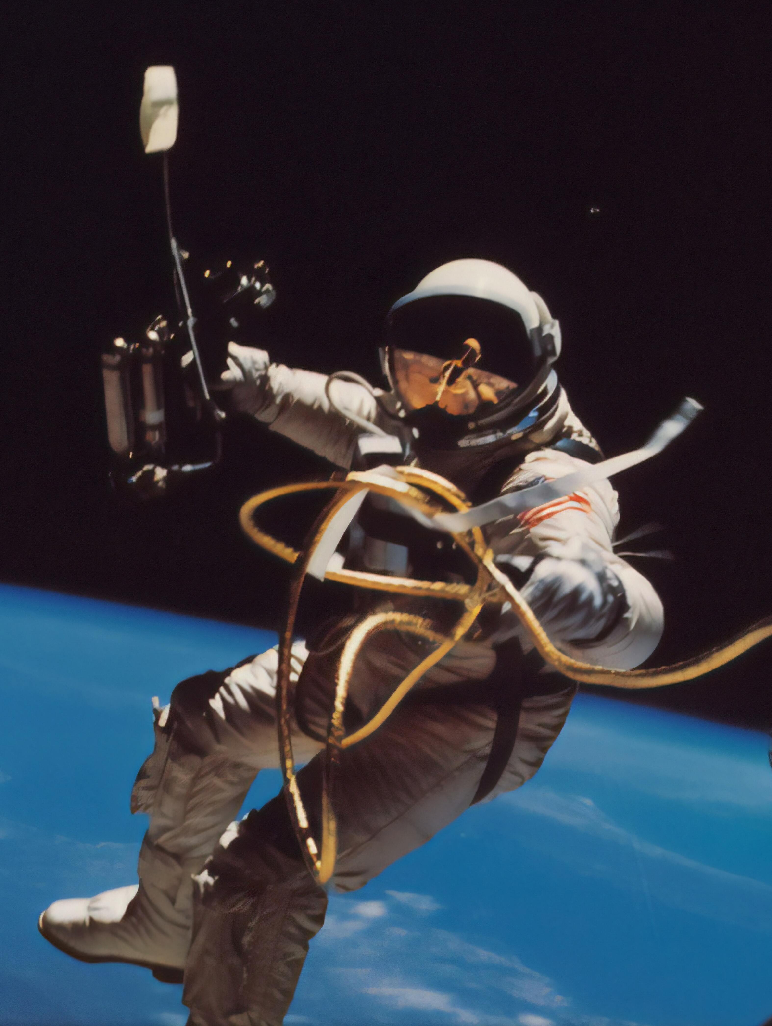 astronaut's golden visor glinting in space